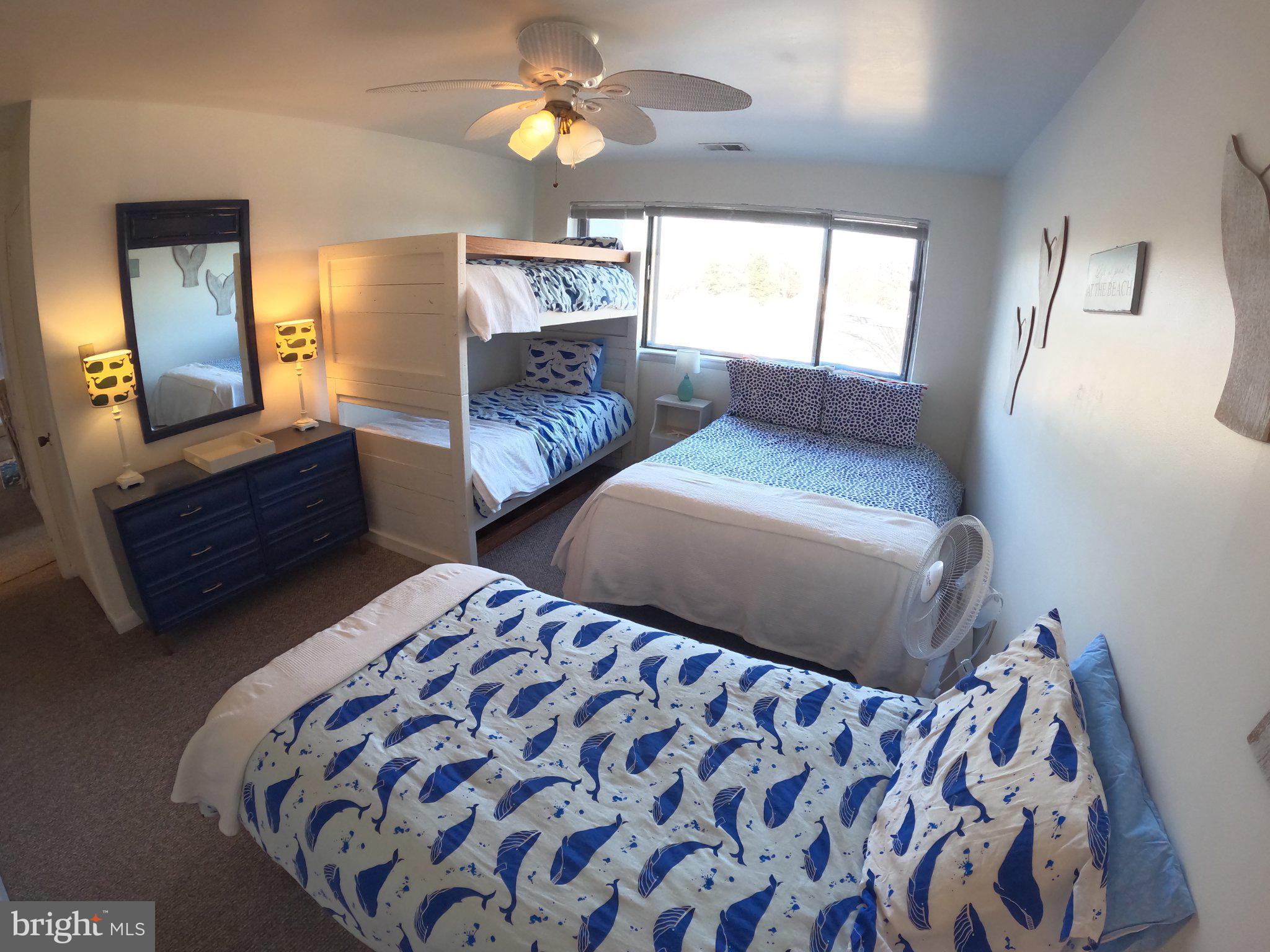 13907 Sand Dune Road, Unit 9A Ocean City, MD 21842 - Photo 25 of 28 Cozy coastal-themed bedroom retreat.