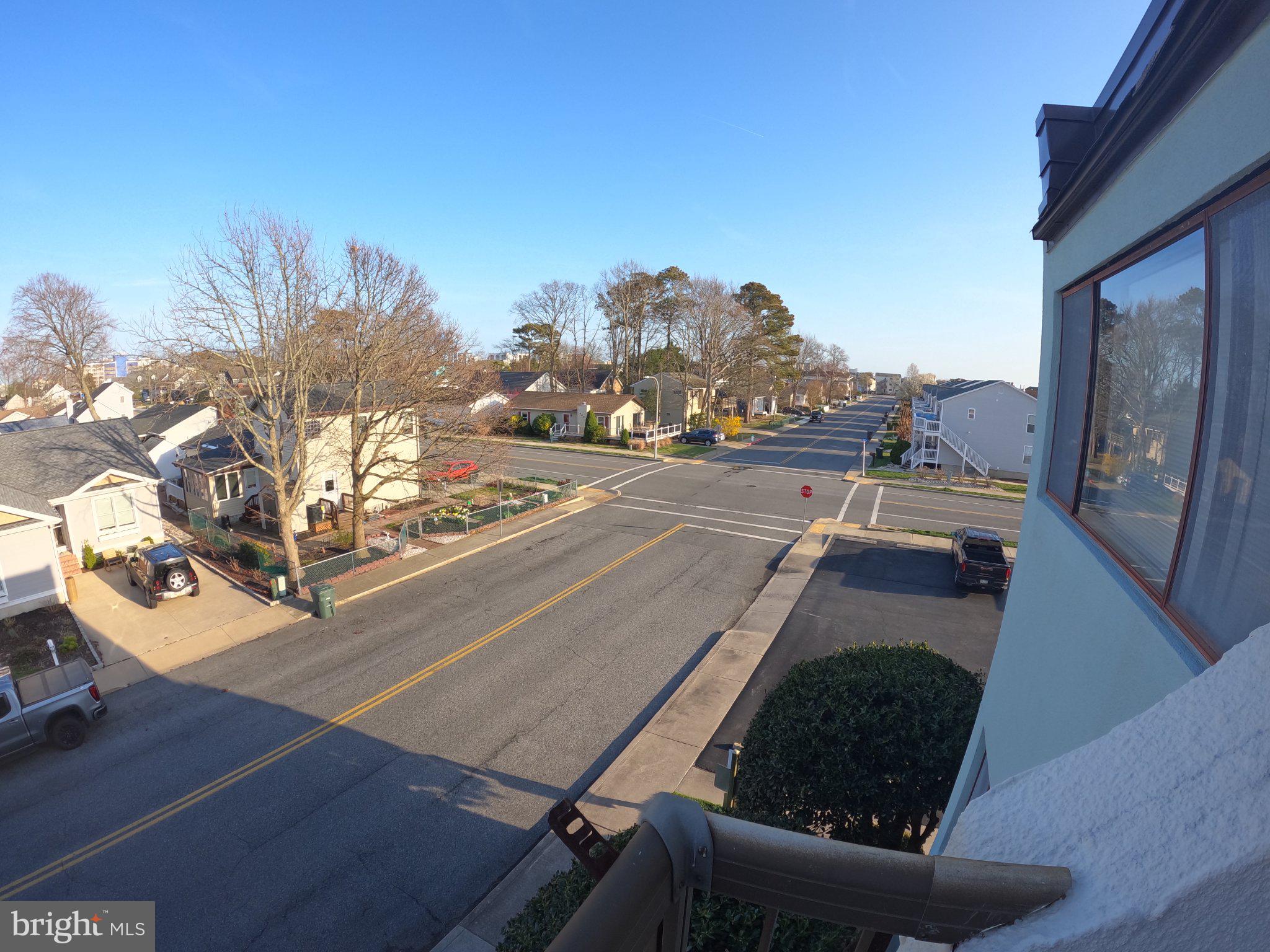 13907 Sand Dune Road, Unit 9A Ocean City, MD 21842 - Photo 7 of 28 Charming neighborhood view at dusk.
