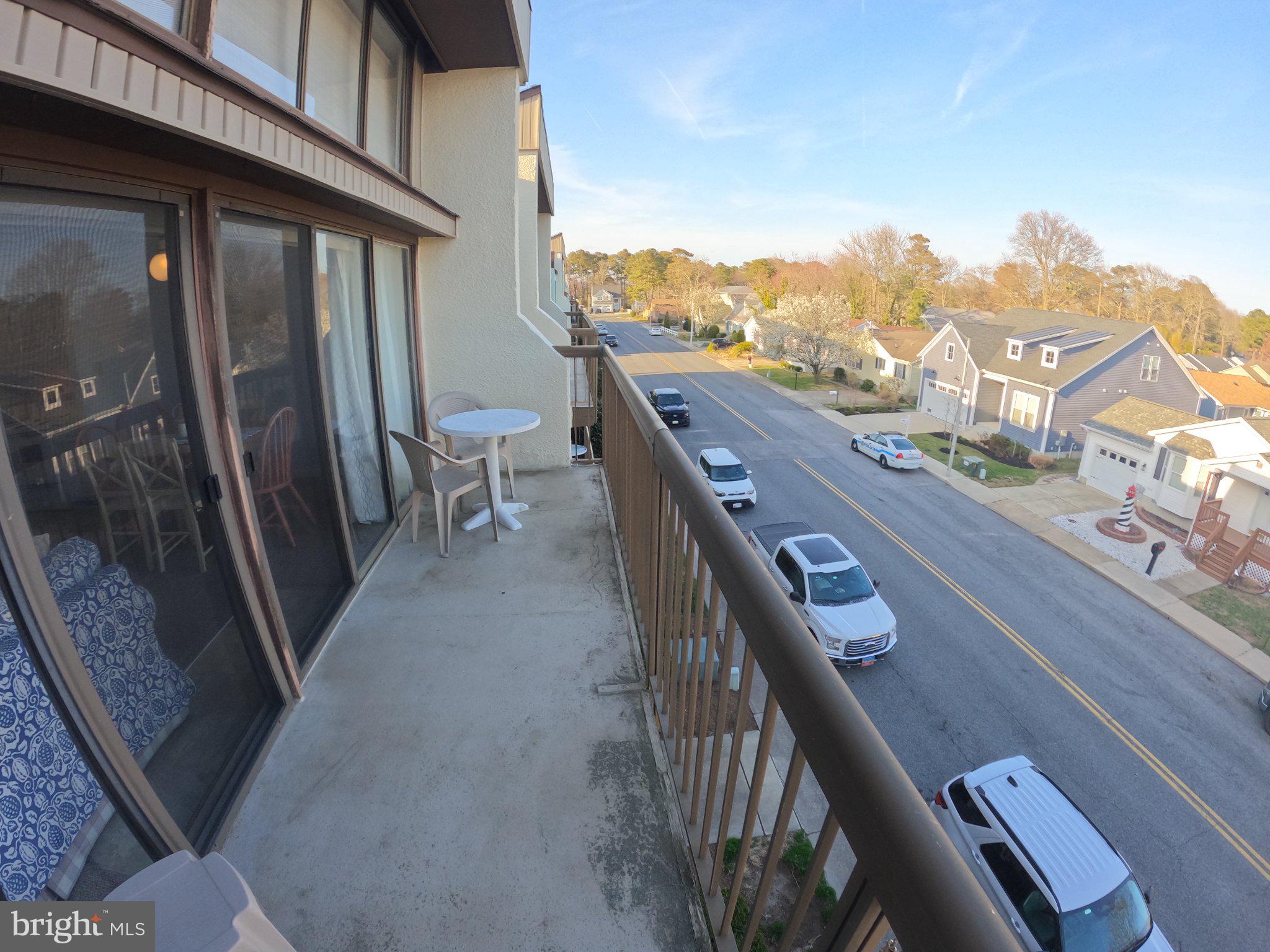 13907 Sand Dune Road, Unit 9A Ocean City, MD 21842 - Photo 9 of 28 Sunny balcony with street views.