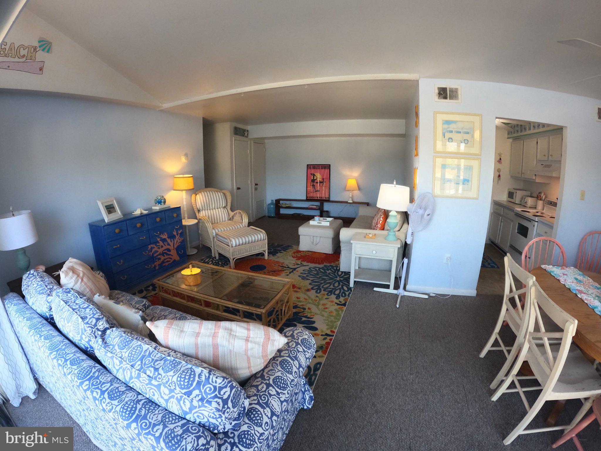 13907 Sand Dune Road, Unit 9A Ocean City, MD 21842 - Photo 10 of 28 Cozy coastal retreat with vibrant decor.