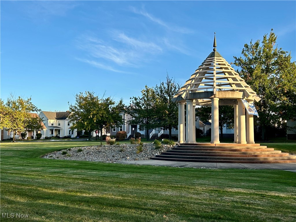 4420 Archer Road Cleveland, OH 44105 - Photo 16 of 18 View of the gazebo in the entrance of this beautiful development. community featuring a gazebo, a yard, and a patio area
