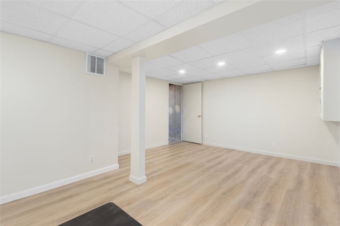 257 Shannock Road South Kingstown, RI 02879 - Photo 32 of 48 Finished basement space with ample unfinished storage space too
