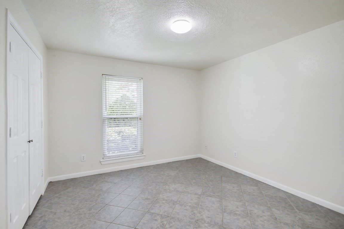 3203 Willie Way Spring, TX 77380 - Photo 11 of 31 an empty room with a window
