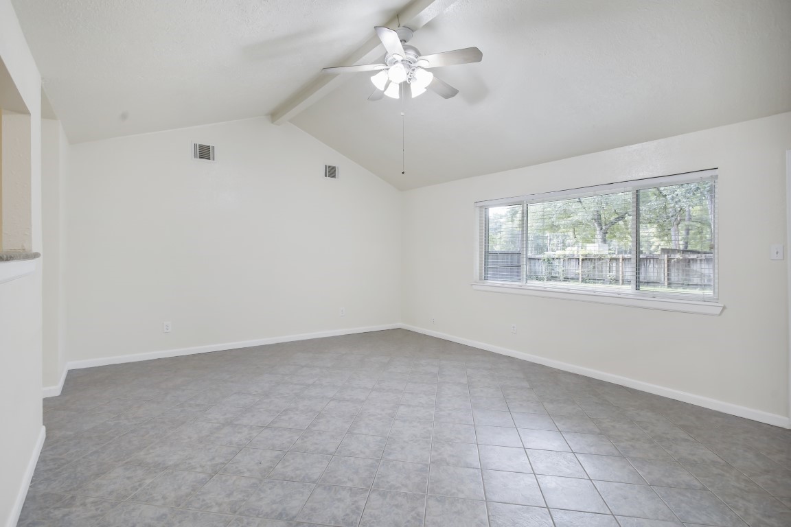 3203 Willie Way Spring, TX 77380 - Photo 22 of 31 an empty room with a window and a fan