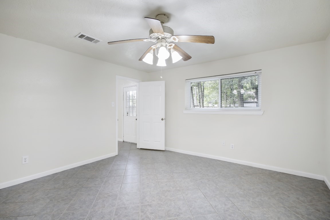 3203 Willie Way Spring, TX 77380 - Photo 25 of 31 a view of an empty room with a window