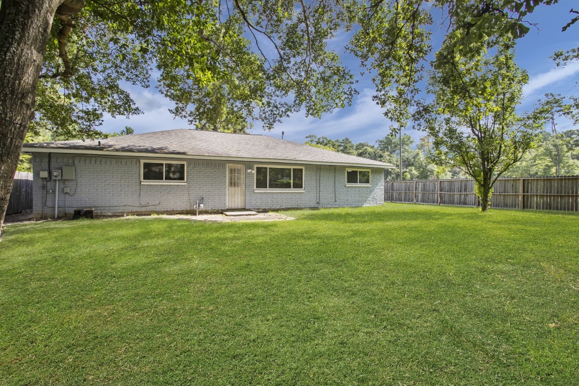 3203 Willie Way Spring, TX 77380 - Photo 28 of 31 a front view of house with yard and green space