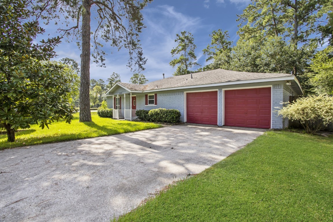 3203 Willie Way Spring, TX 77380 - Photo 3 of 31 a view of outdoor space yard and garage