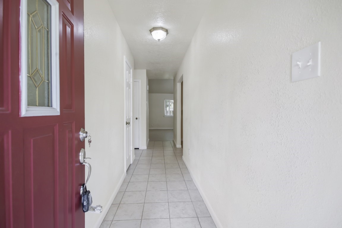 3203 Willie Way Spring, TX 77380 - Photo 5 of 31 a view of a hallway with wooden floor