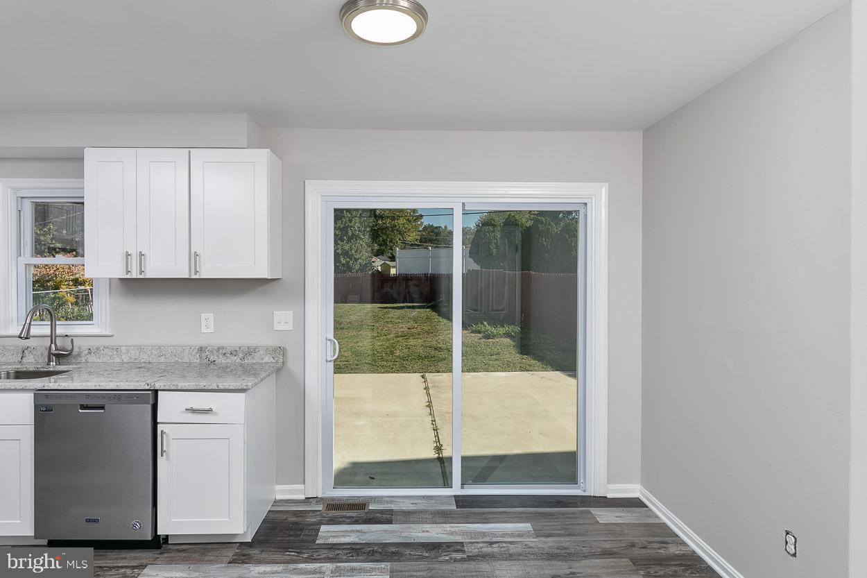 8305 Overmont Road Baltimore, MD 21234 - Photo 14 of 39 Eat-In Kitchen Area with Slider to Large Patio.