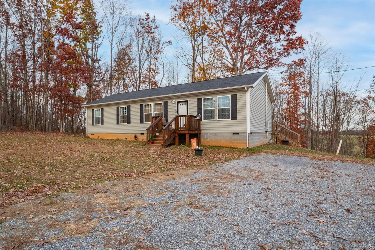 1736 Timber Ridge Road Bedford, VA 24523 - Photo 3 of 29 a view of house with a backyard