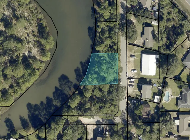 a view of multiple houses with outdoor space