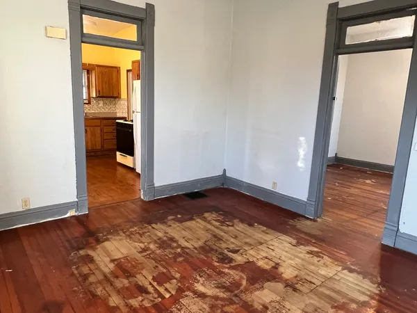 a view of entryway with wooden floor