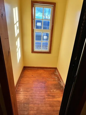 a kitchen with stainless steel appliances granite countertop a refrigerator a stove a sink and dishwasher