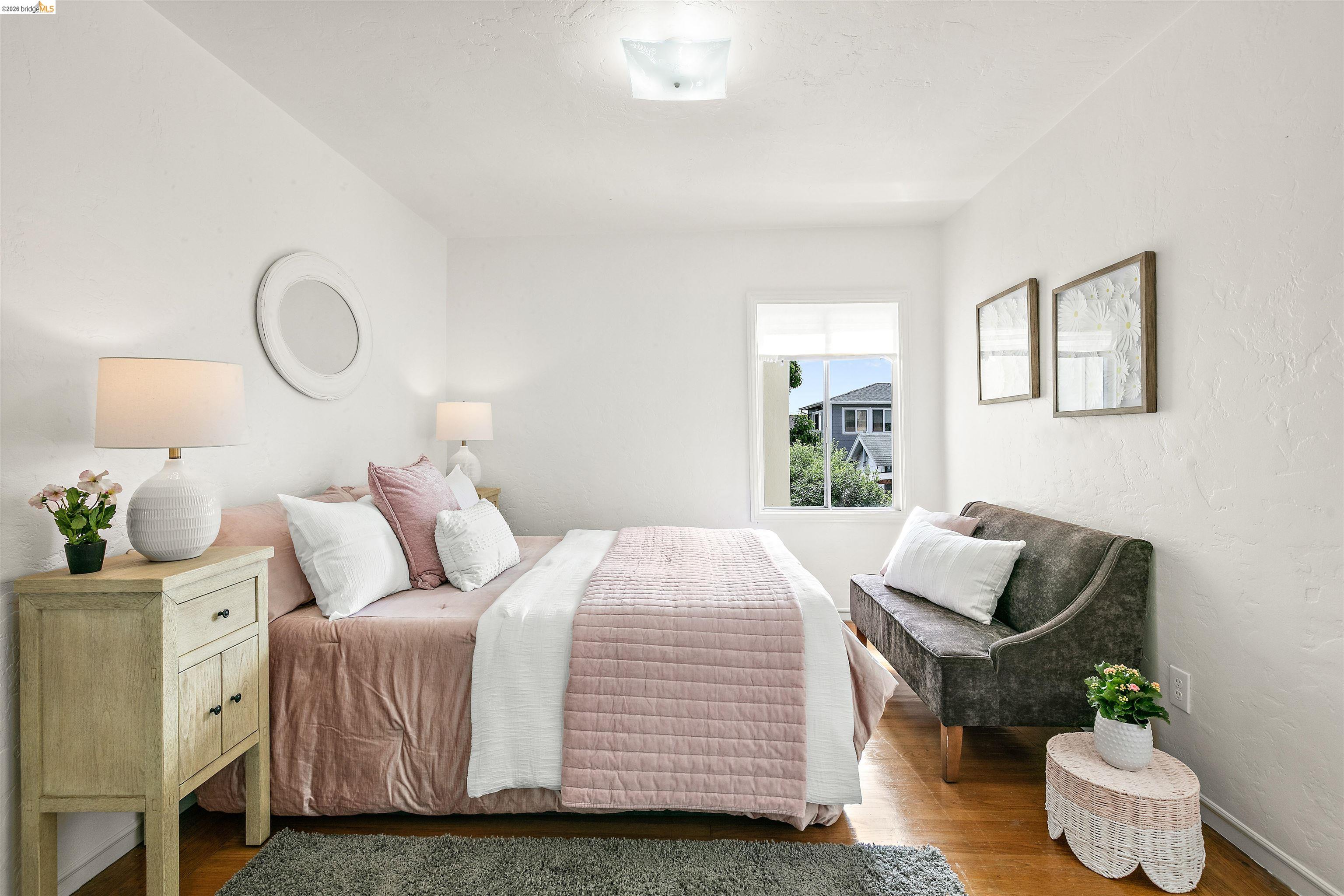 910 Pierce Street Albany, CA 94706 - Photo 15 of 44 a bedroom with a bed and window