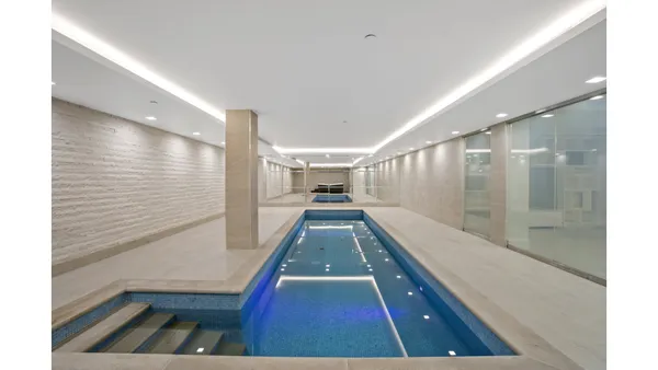 a room with stairs and furniture