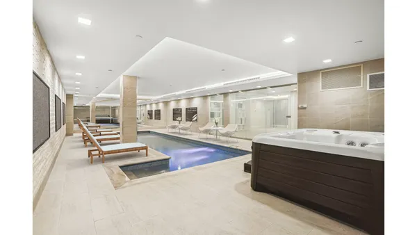 a black and white photo of a living room