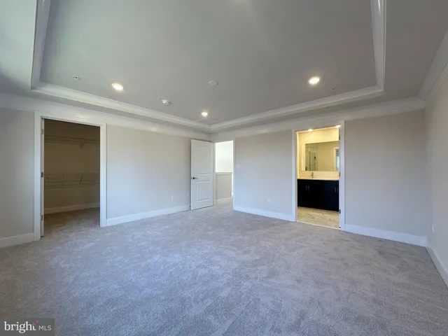 a bathroom with a double vanity sink mirror and shower