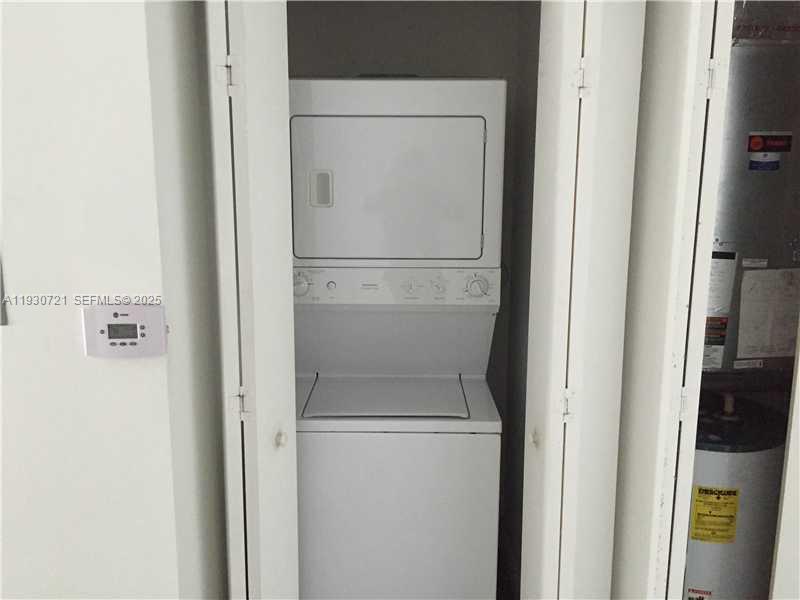 690 Southwest 1st Court, Unit 1727 Miami, FL 33130 - Photo 15 of 15 a utility room with dryer and washer