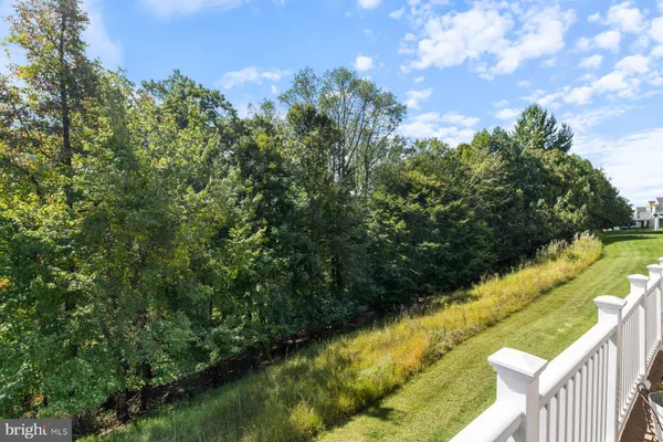 a view of a lake from a balcony