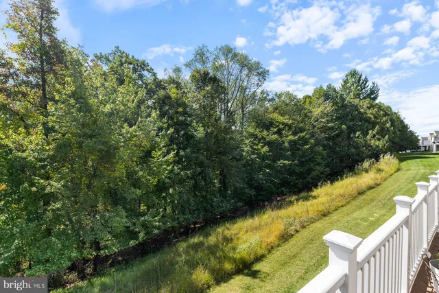 a view of a lake from a balcony