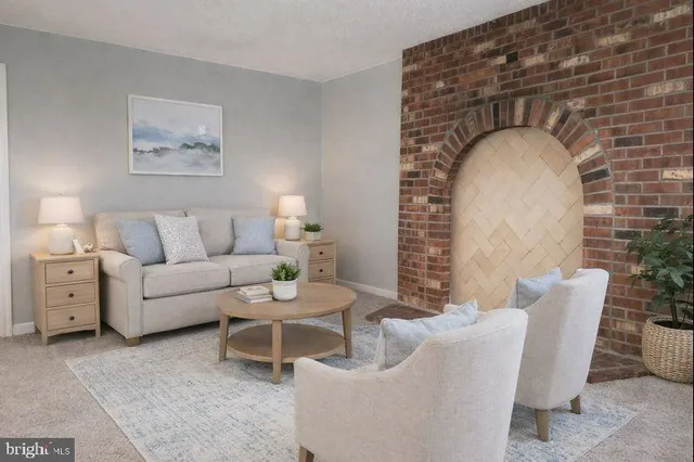 a bedroom with a bed and a lamp on table