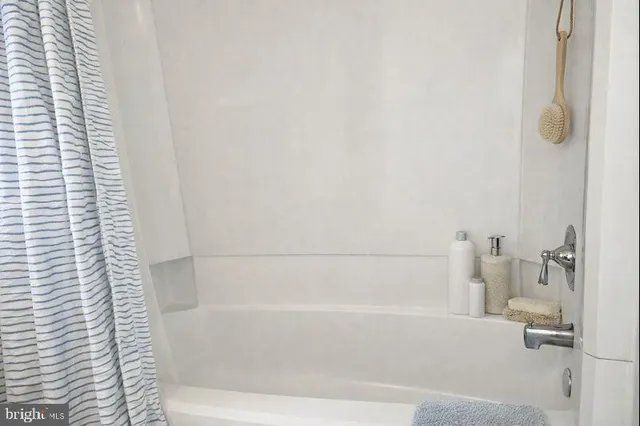 a bedroom with a bed and a closet