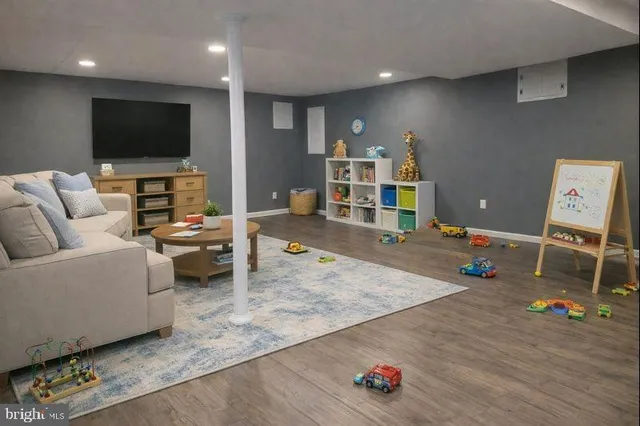 a view of storage and utility room with closet