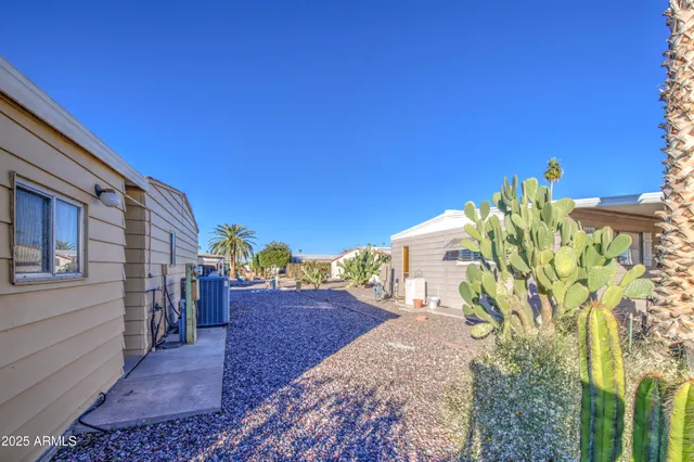 a view of a back yard of the house