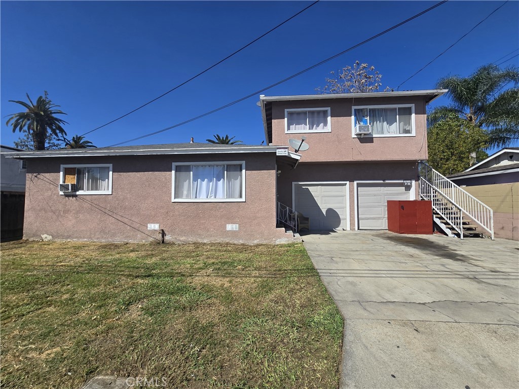 9813 Cortada Street El Monte, CA 91733 - Photo 1 of 7 a house view with a garden space