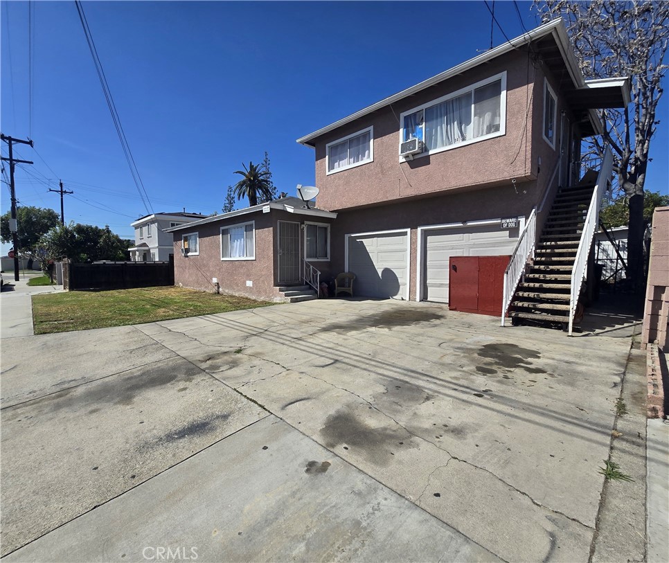 9813 Cortada Street El Monte, CA 91733 - Photo 2 of 7 a front view of a house with a yard