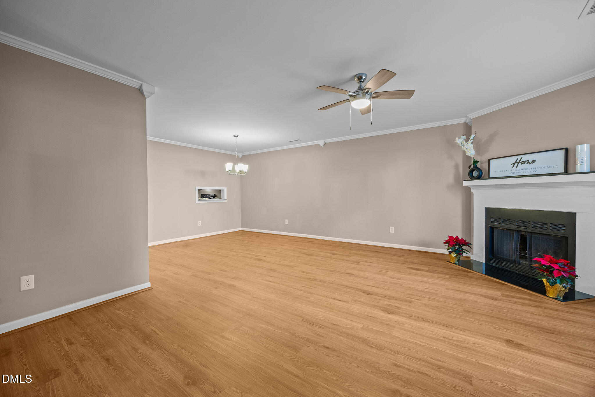 1524 Township Circle Raleigh, NC 27609 - Photo 11 of 30 a view of empty room with fan and fireplace