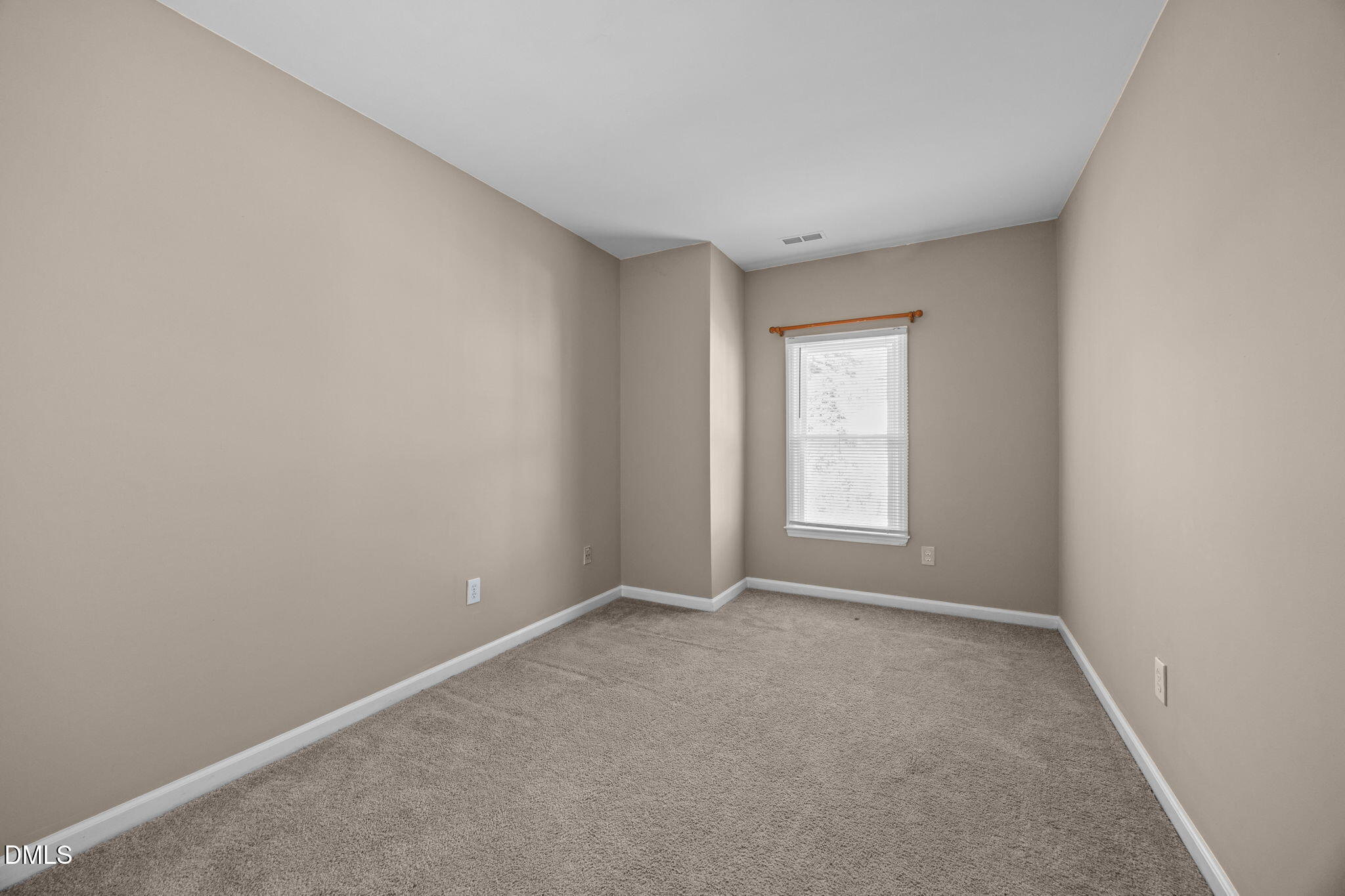 1524 Township Circle Raleigh, NC 27609 - Photo 17 of 30 a view of an empty room with a window