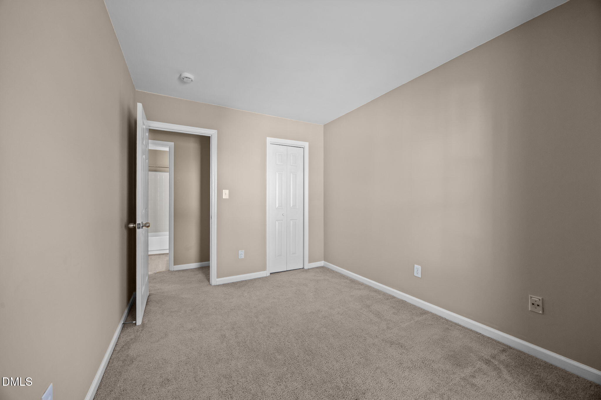 1524 Township Circle Raleigh, NC 27609 - Photo 18 of 30 an empty room with closet area