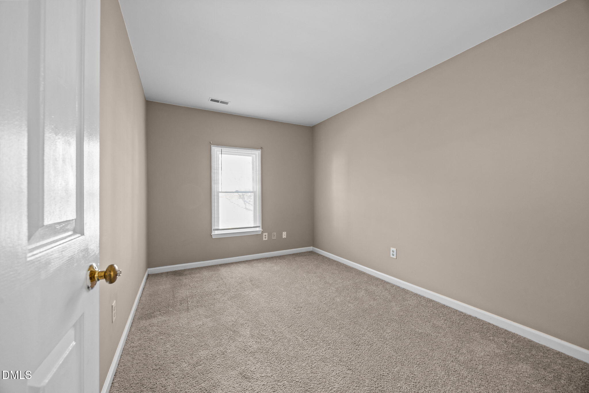 1524 Township Circle Raleigh, NC 27609 - Photo 19 of 30 a view of an empty room with a window