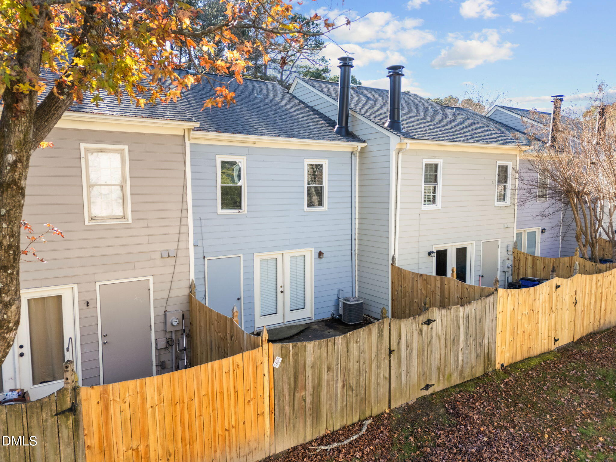 1524 Township Circle Raleigh, NC 27609 - Photo 23 of 30 a view of a house with wooden fence