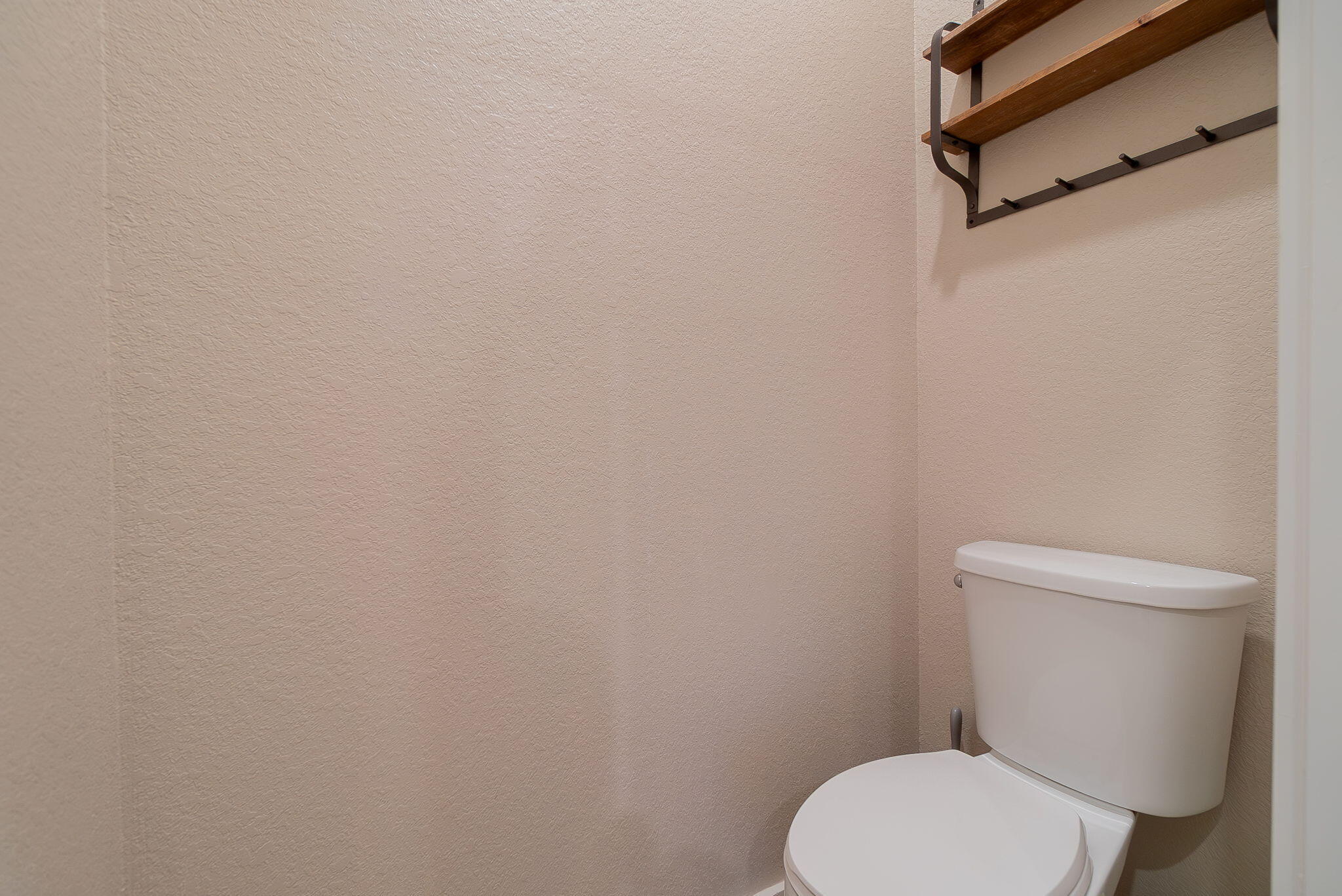 19546 Weathervane Way Loxahatchee, FL 33470 - Photo 30 of 63 a white toilet sitting next to a white wall