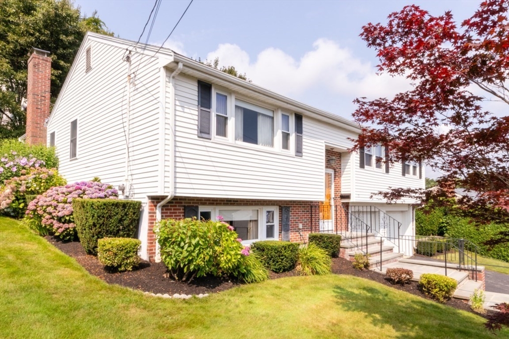 35 Gardiner Road Quincy, MA 02169 - Photo 1 of 35 a front view of a house with garden