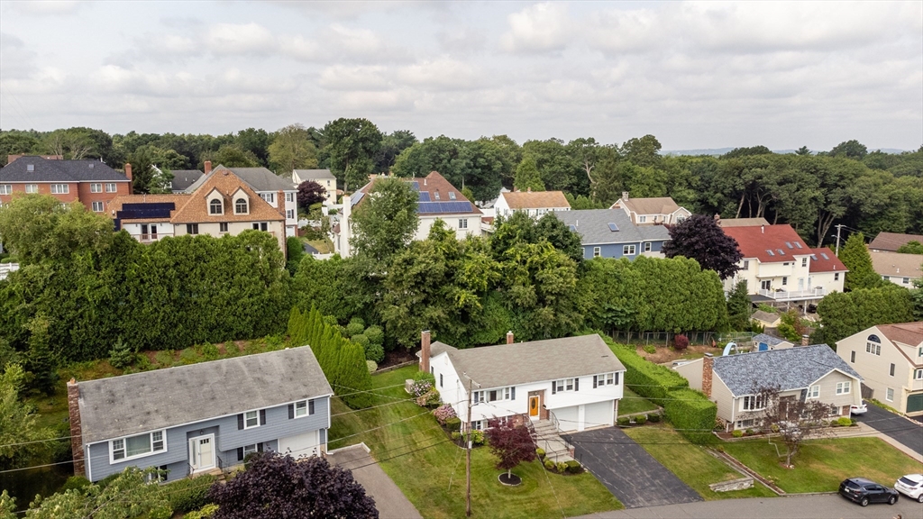 35 Gardiner Road Quincy, MA 02169 - Photo 32 of 35 an aerial view of a house with a garden