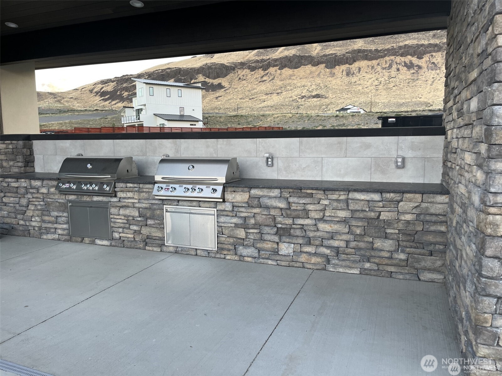 240 Basin Pointe Loop Vantage, WA 98950 - Photo 15 of 22 a kitchen with stainless steel appliances a stove and a refrigerator