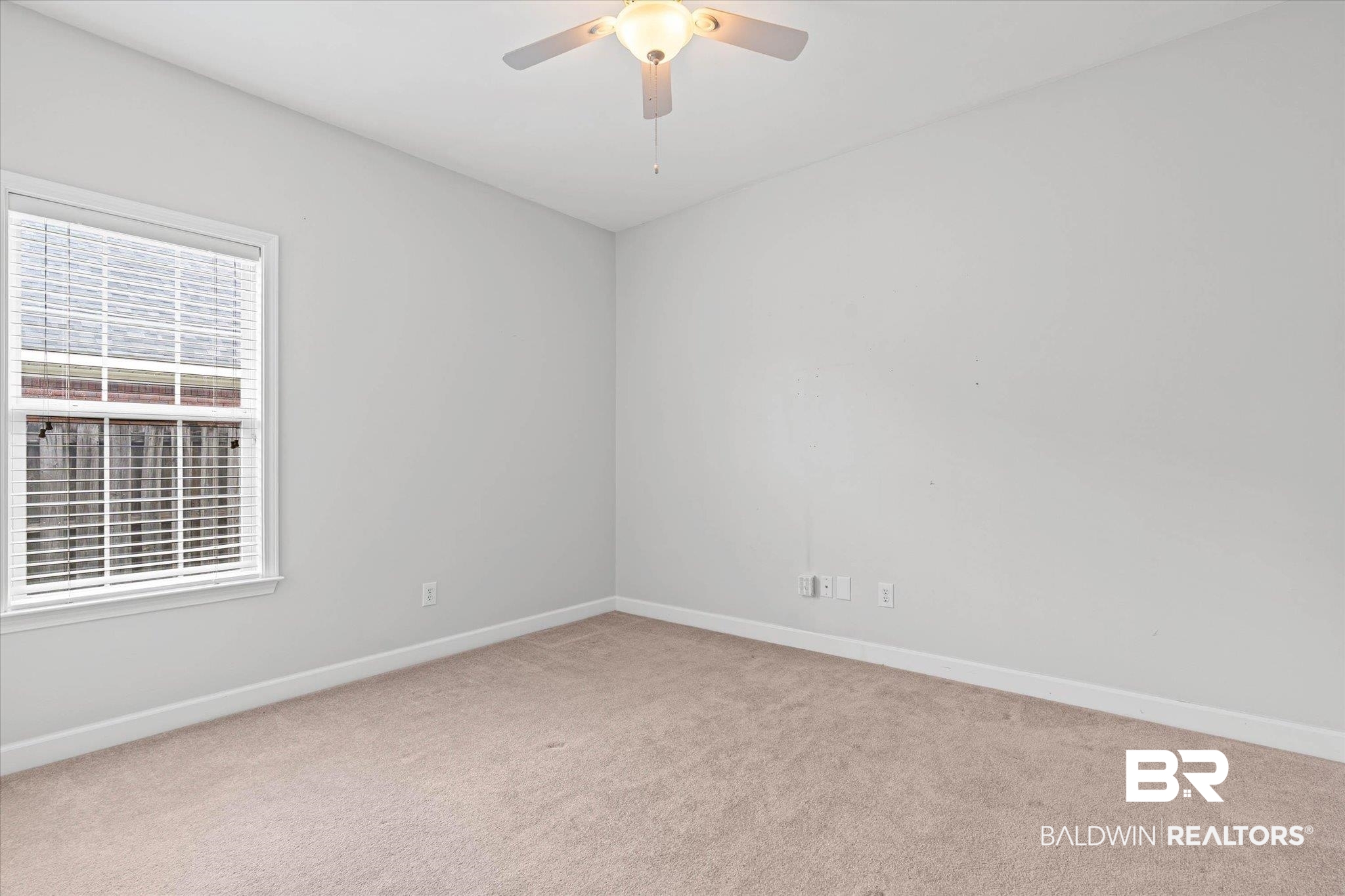 1003 Weatherby Street South Saraland, AL 36571 - Photo 21 of 31 Carpeted empty room with baseboards and a ceiling fan