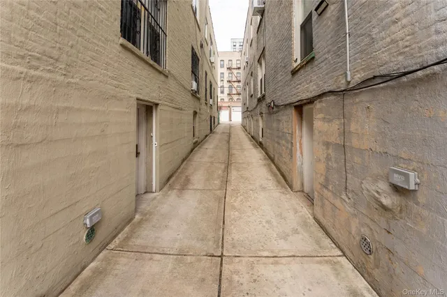 a view of a pathway along a building