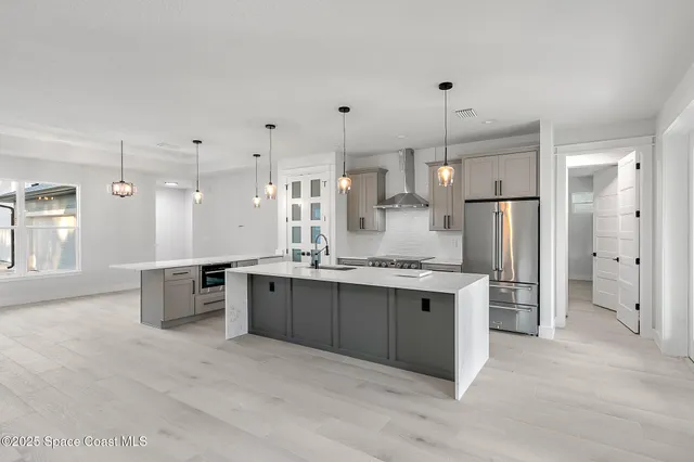 a view of a room with a sink and a window