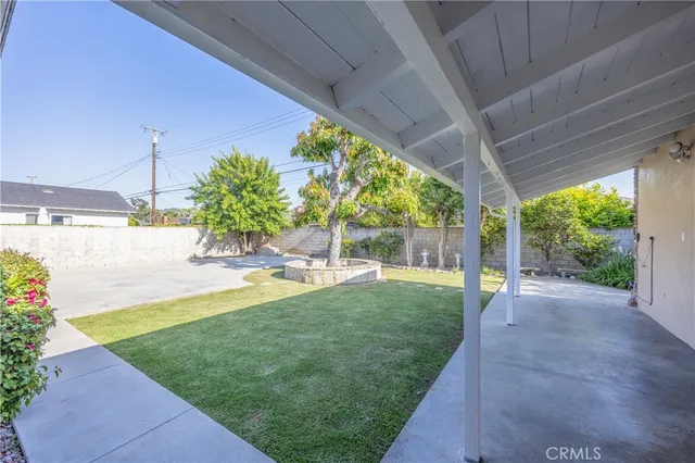 a view of a backyard with porch