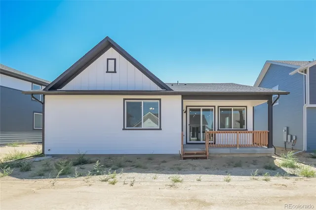 a front view of a house with garage
