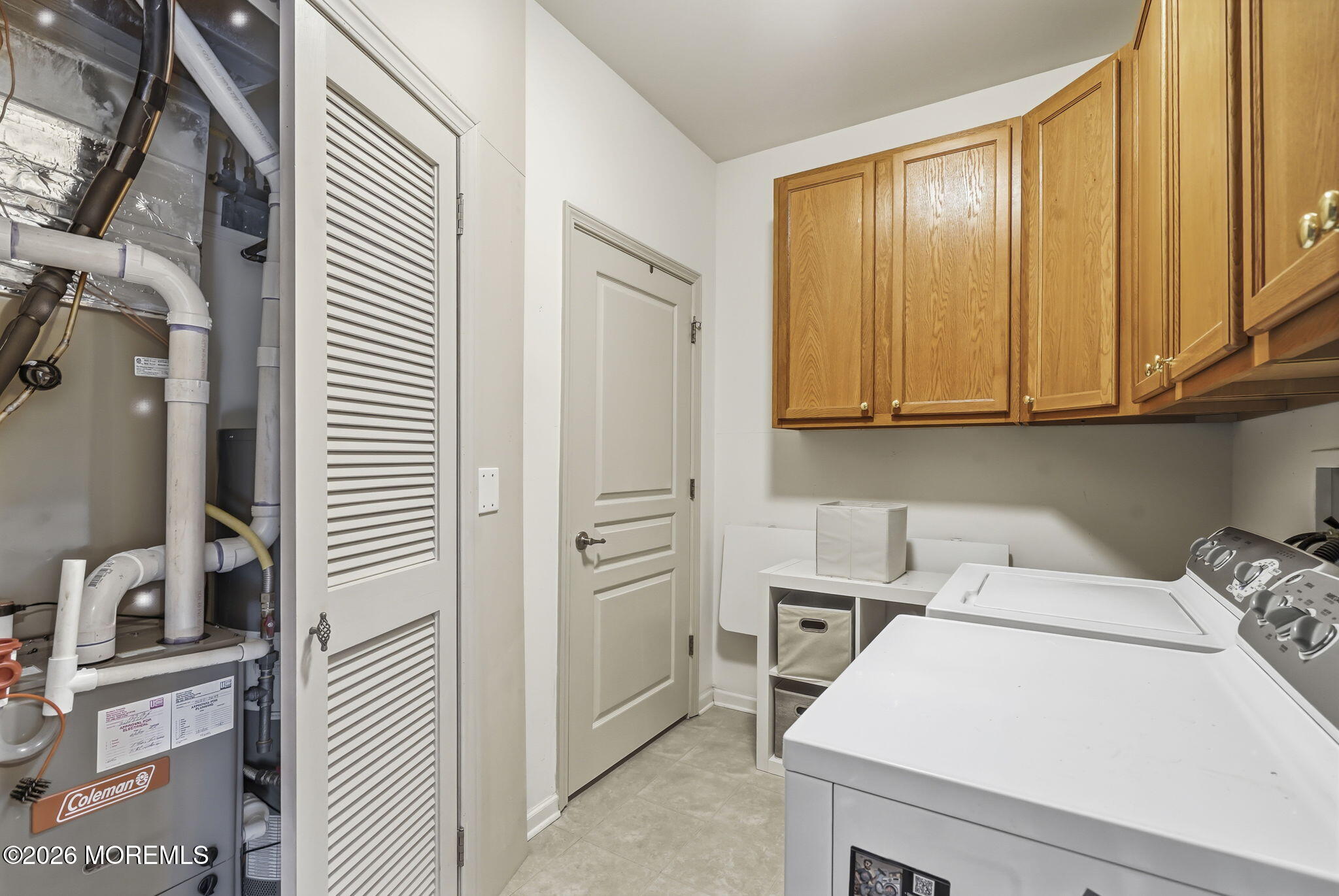 106 Potts Road Morganville, NJ 07751 - Photo 19 of 25 a utility room with dryer and washer