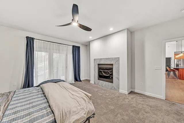 a bathroom with a shower curtain and a sink