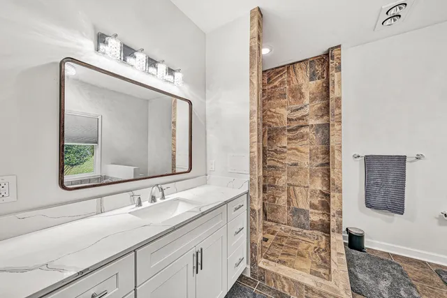 a view of balcony with furniture and wooden deck