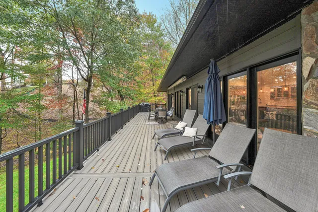 a view of a livingroom with furniture and wooden floor