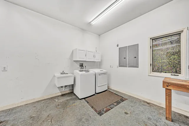 a room with furniture and wooden floor