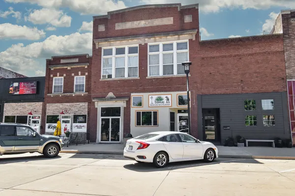 a car parked in front of a building